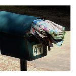 An overflowing letterbox