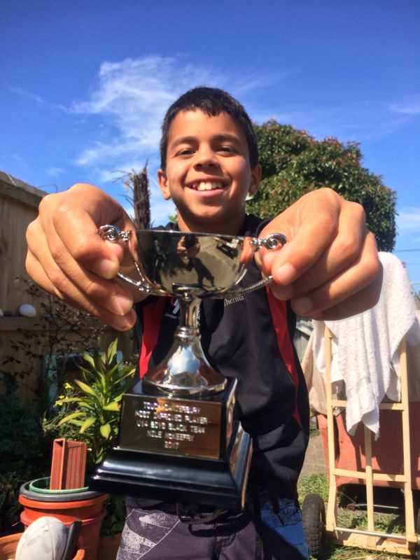 Nile holding his trophy